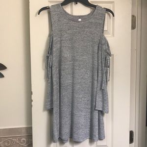 Cold shoulder tunic blouse.